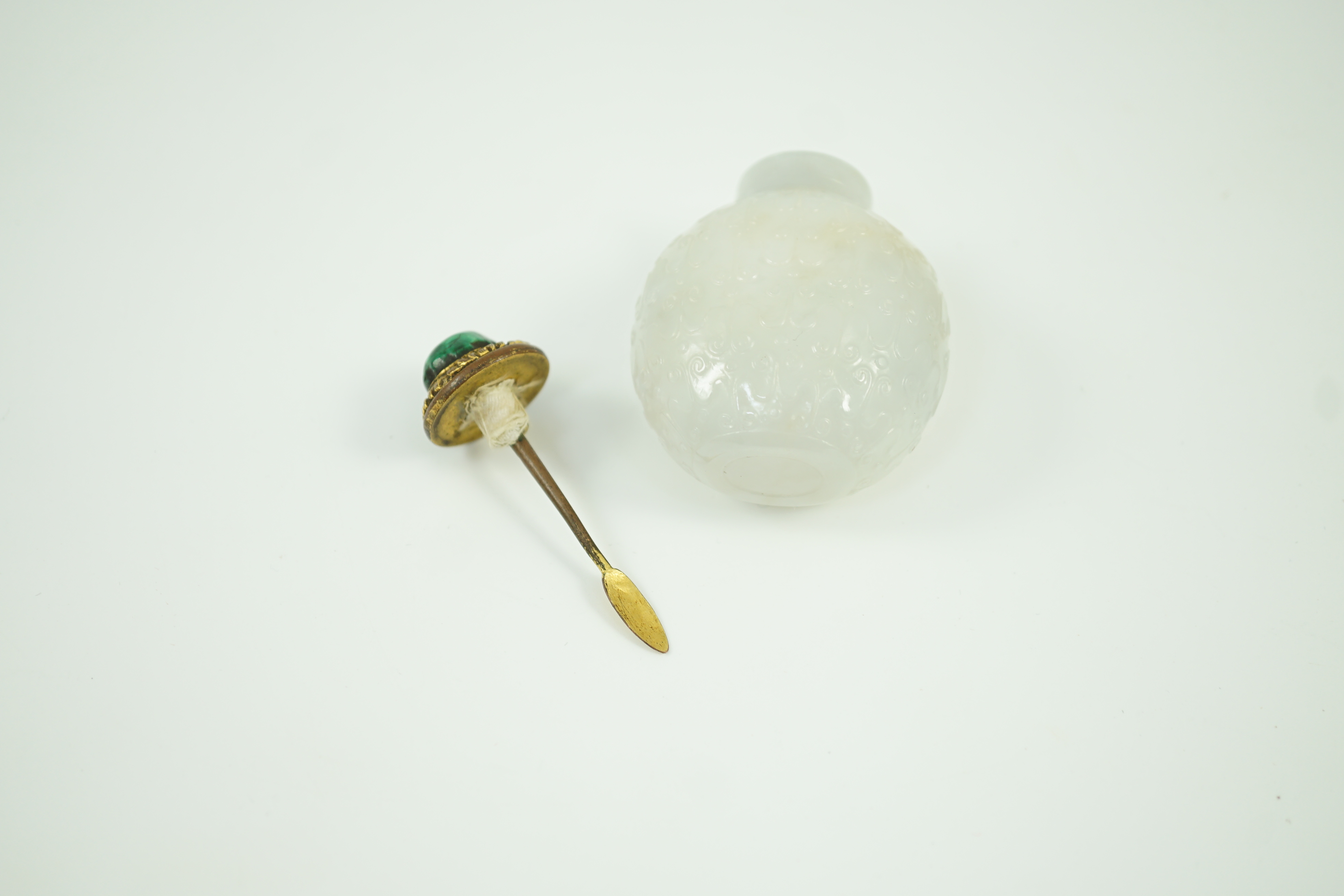 A good Chinese archaistic white jade snuff bottle, 1780-1850